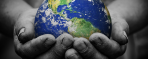 Hand holding the earth